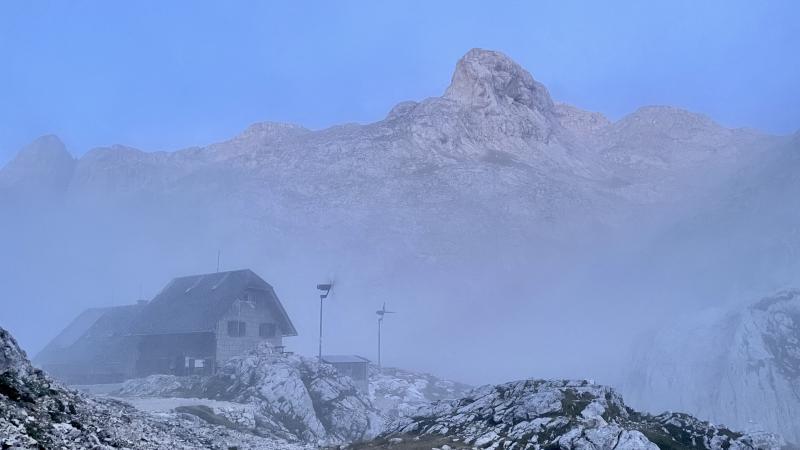 Refugio Koča na Doliču in the morning mist